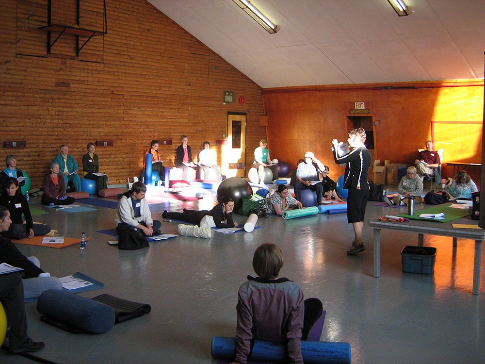 Kathleen teaching a pilates workshop