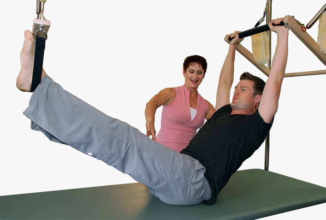 kathleen and a student doing pilates
