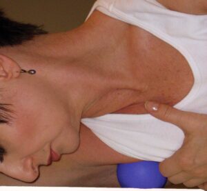 Self myofascial release of pectoralis minor using a therapy ball